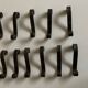Set of 11 knife holders in beaten iron Provence 1950