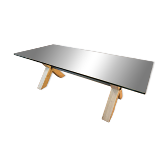 Rectangular dining table with glass top from Roche Bobois.
