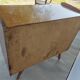 commode aux pieds compas, effet miroir, vintage