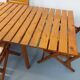 Salon de jardin vintage composé d’une table avec rallonges et 4 fauteuils