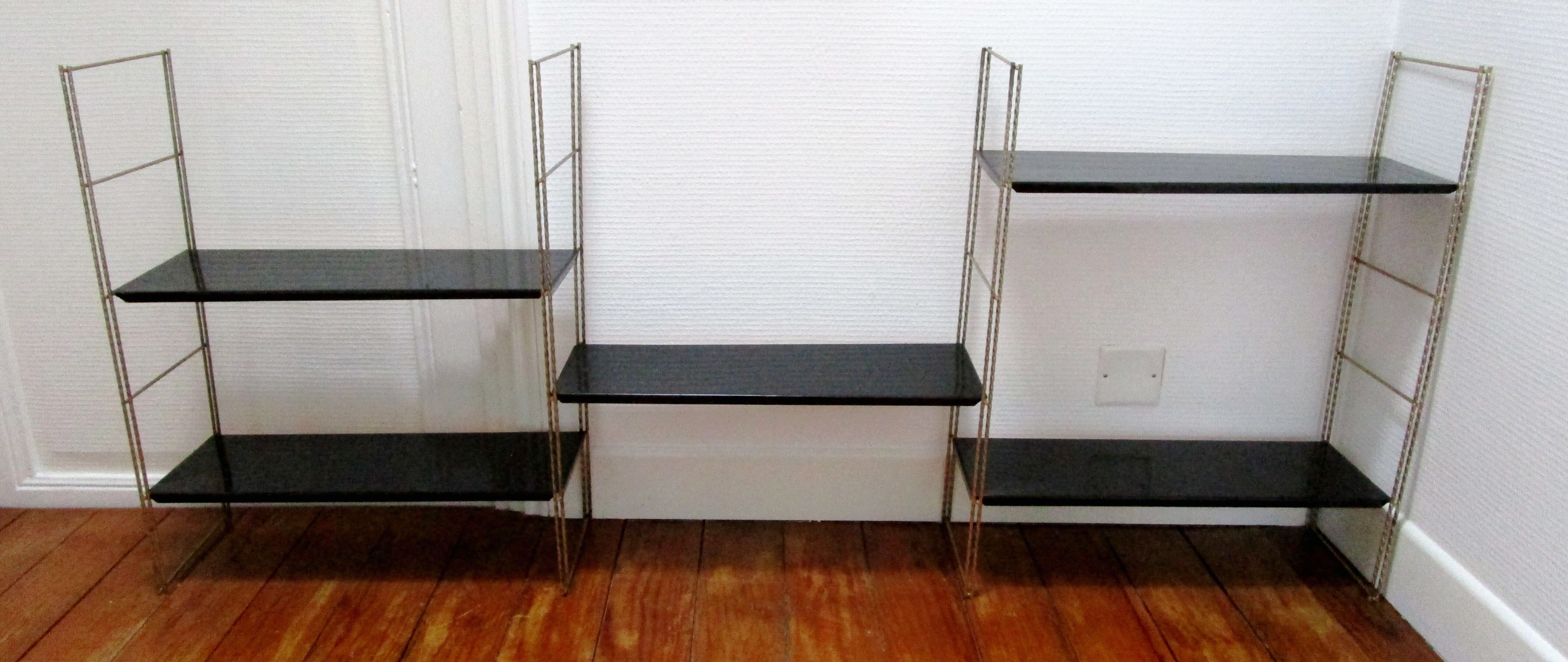 Black and gold metal tomado wall shelf