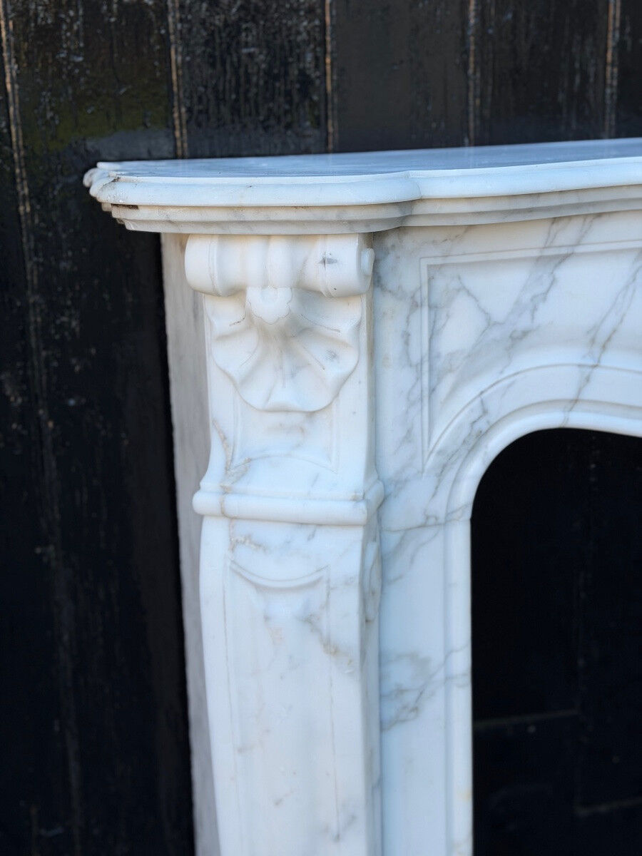 Louis XV style fireplace in Carrara marble, around 1900.