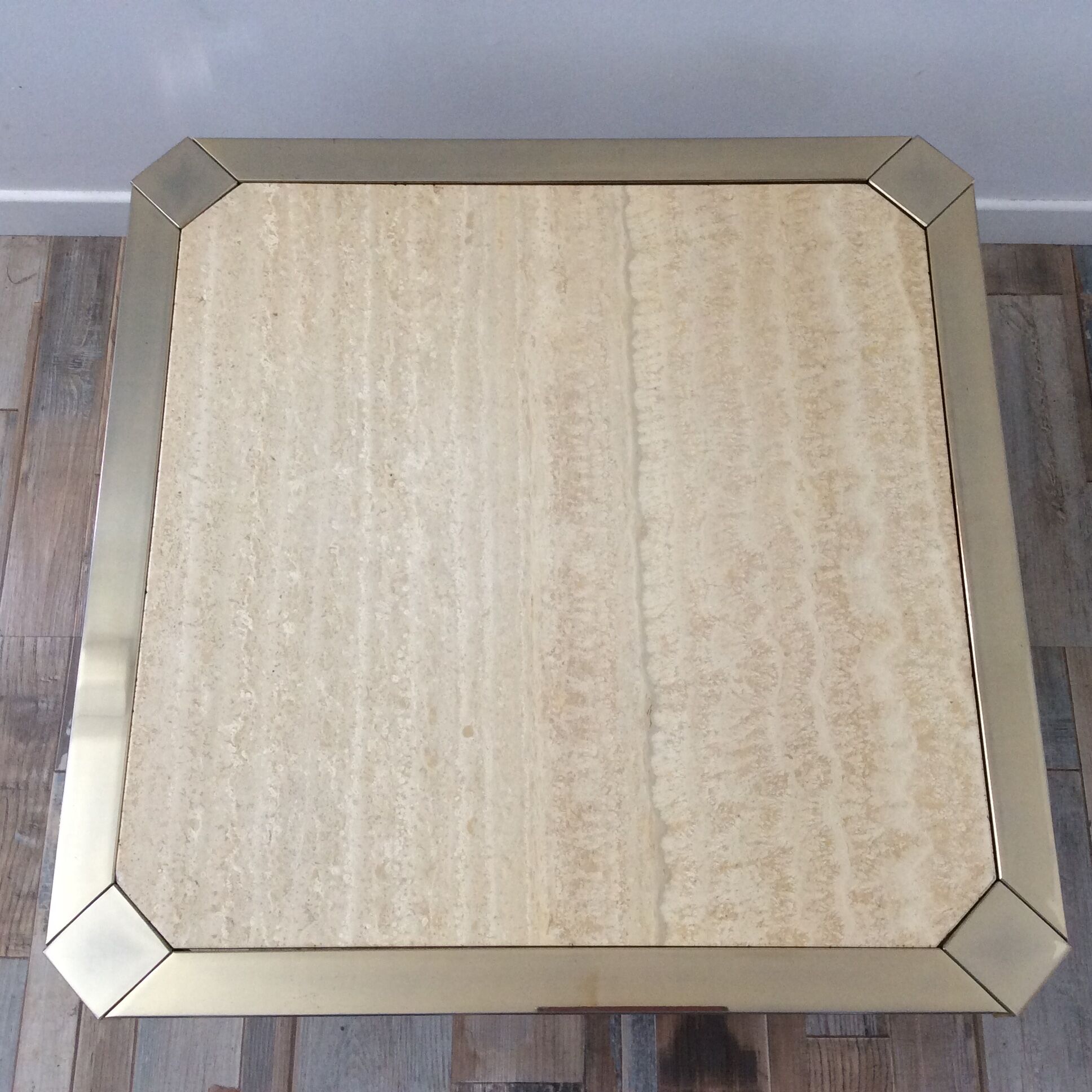 70s Belgochrom coffee table in travertine and gilded contour