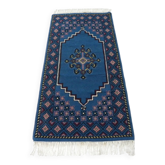 Vintage handmade traditional Tunisian oriental rug in blue.