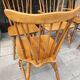 Four chairs and a Heywood Wakefield Windsor armchair. Vintage
