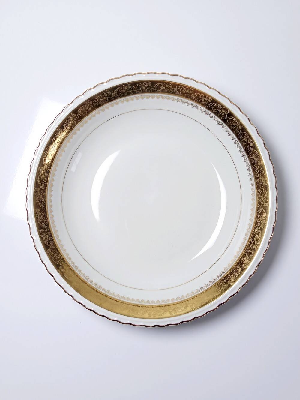 Vintage deep plate in gilded Limoges porcelain, ADP L Royal