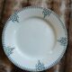 13 mismatched flat plates in ironstone