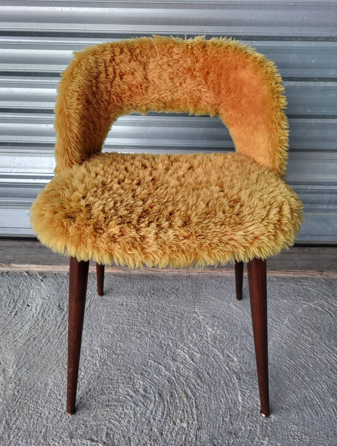 Authentic old vintage furry armchair in good condition