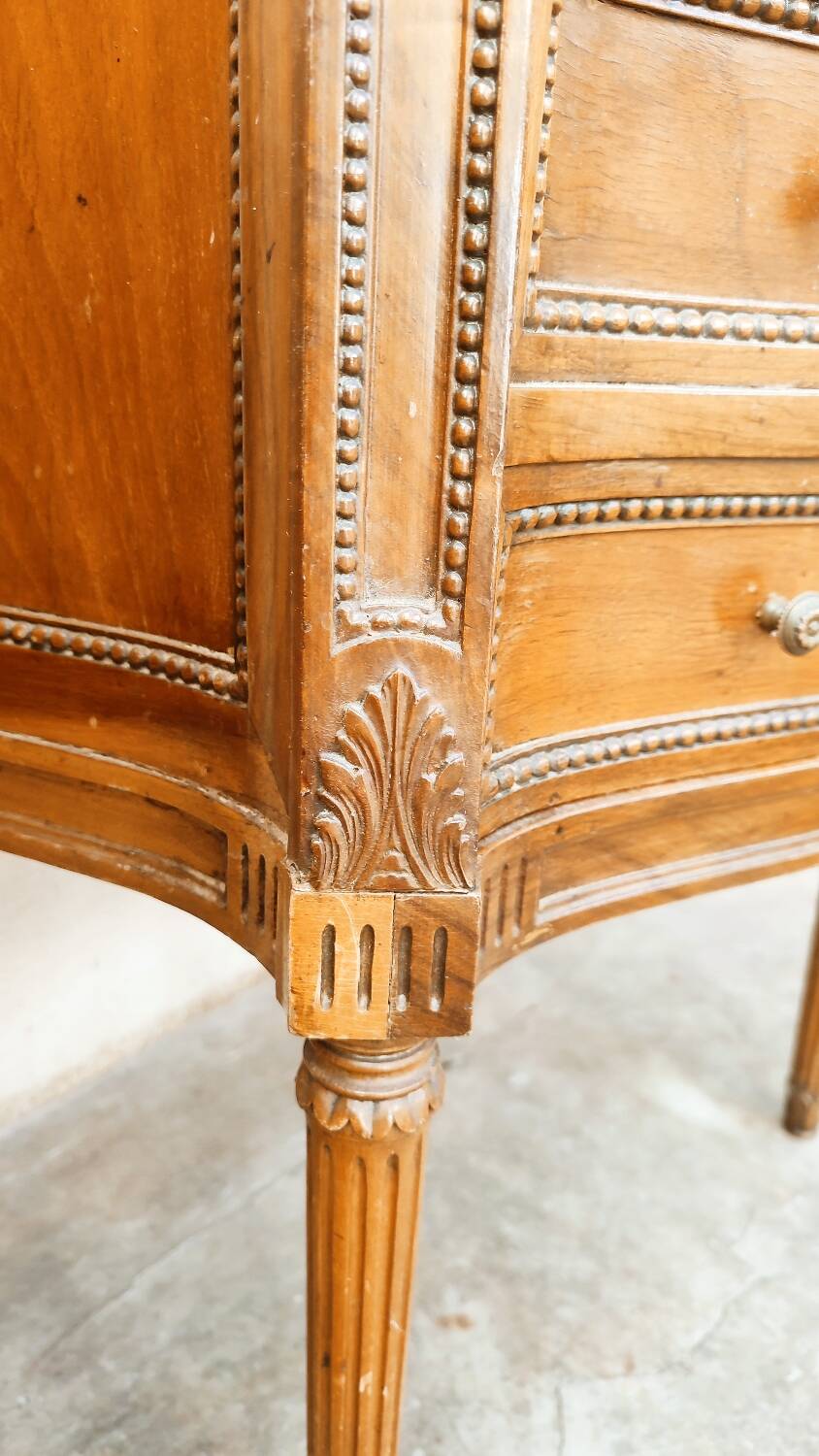 Pair of walnut crossbow chests of drawers