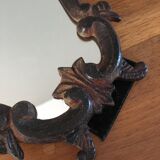 Vintage fiddle mirror to put down.