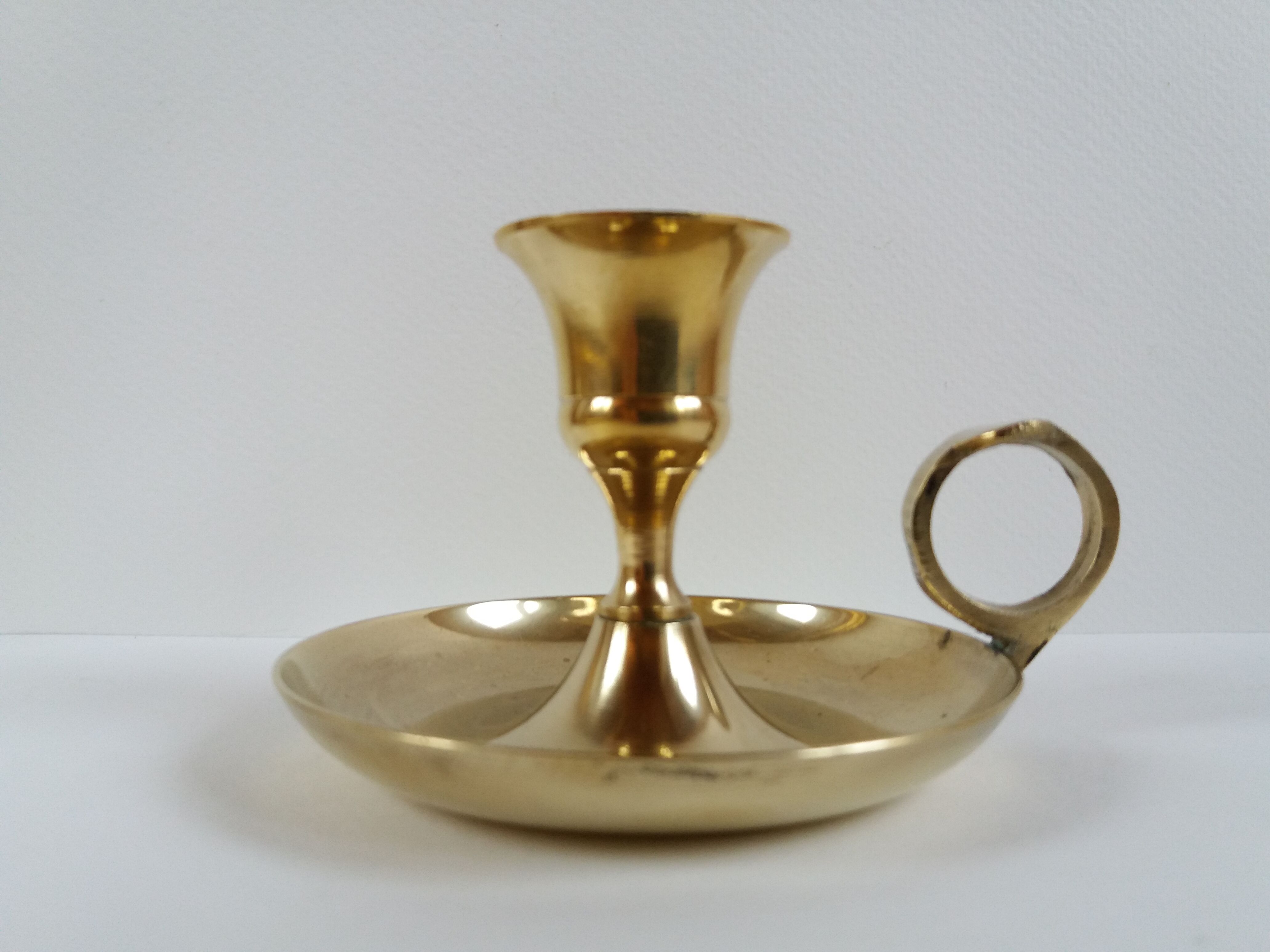 Golden brass cellar rat bougeoir