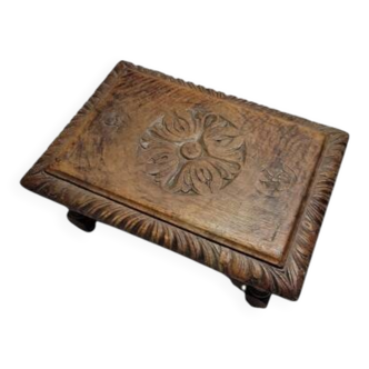 Carved wooden footrest