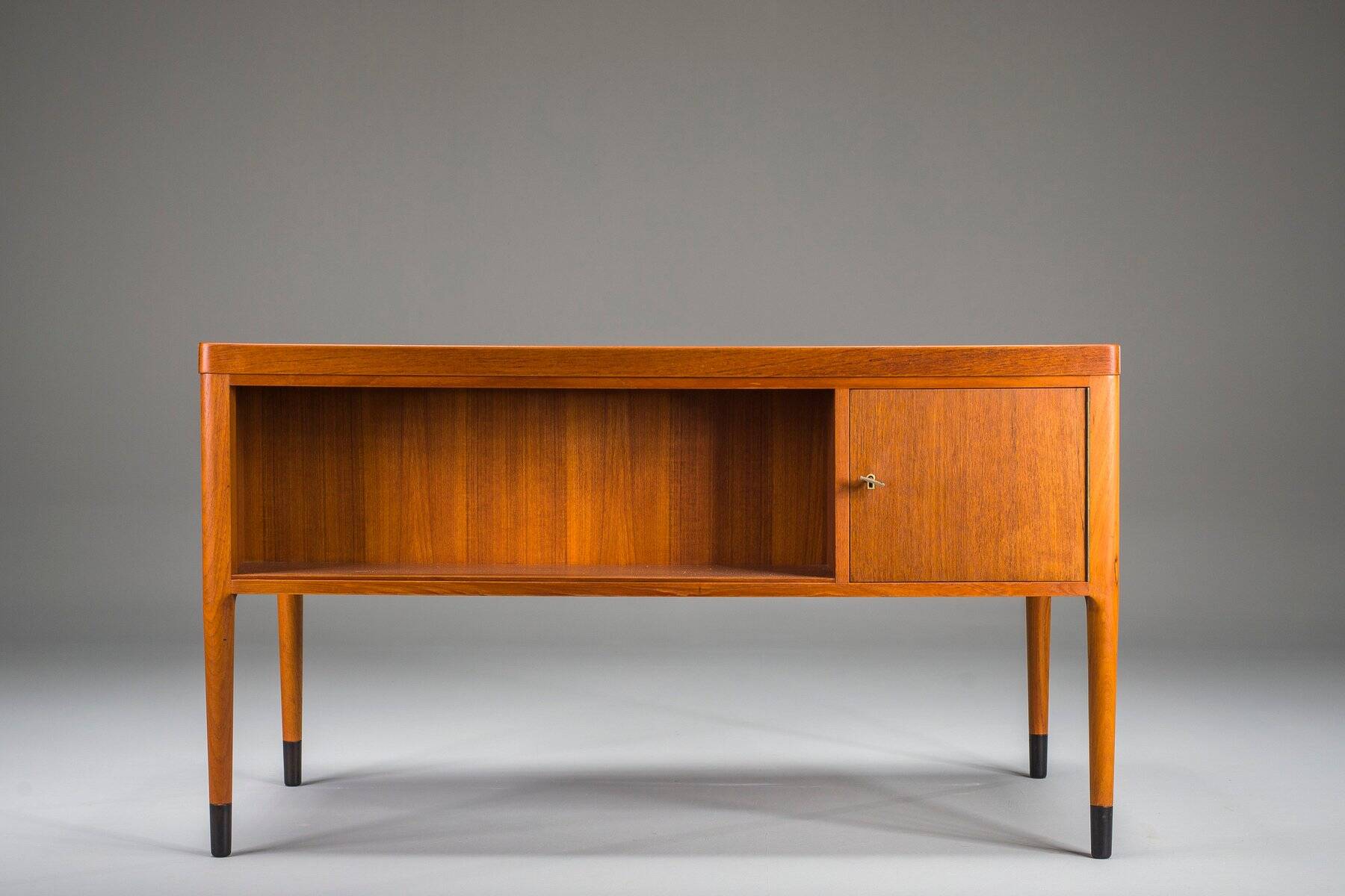 Scandinavian modern teak writing desk attributed to H. Brockmann Petersen for Poul M. Jessen, 1960s