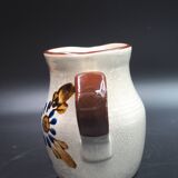 Small stoneware water pot with floral pattern