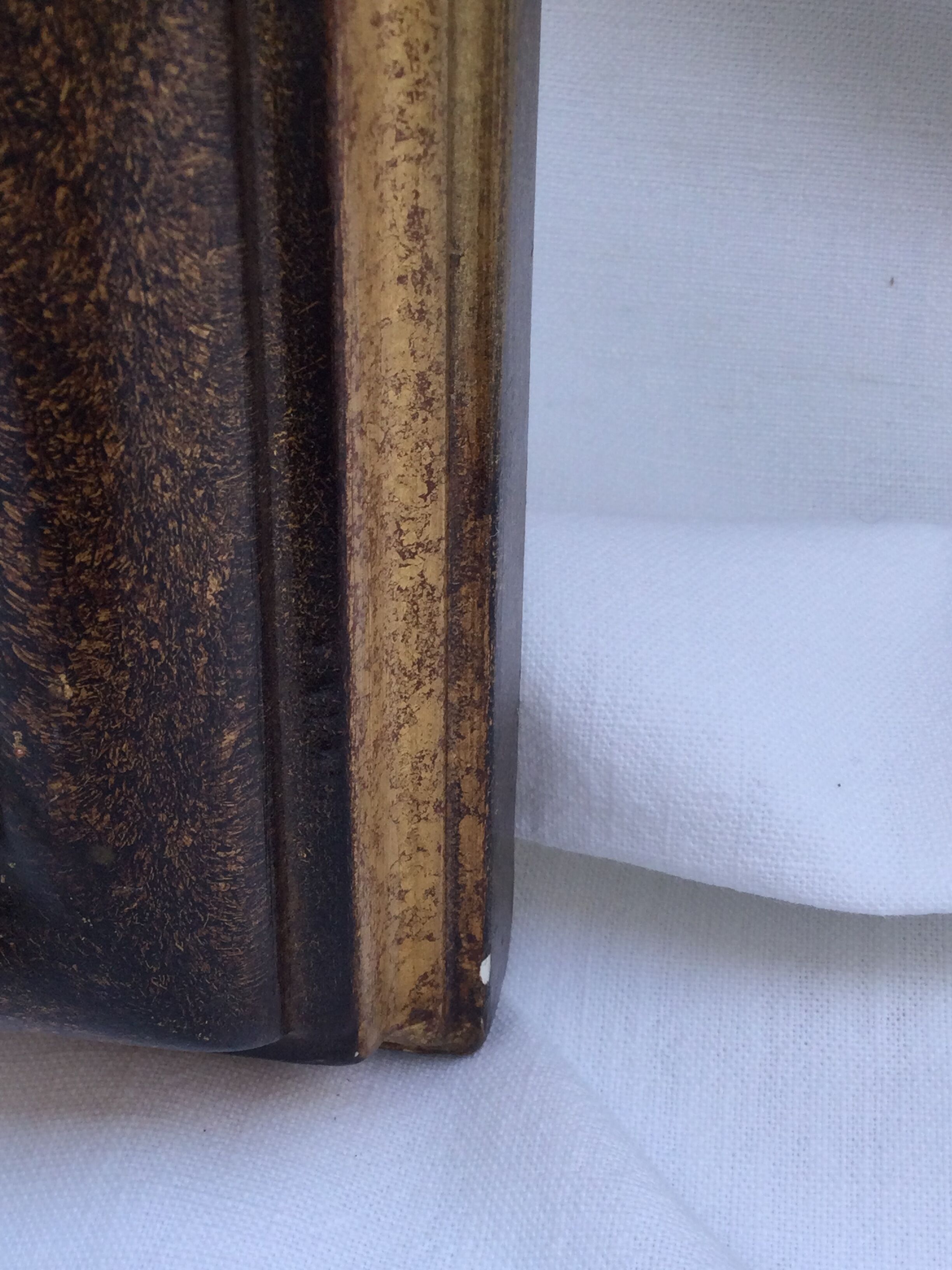 Gilded wooden frame and fabric