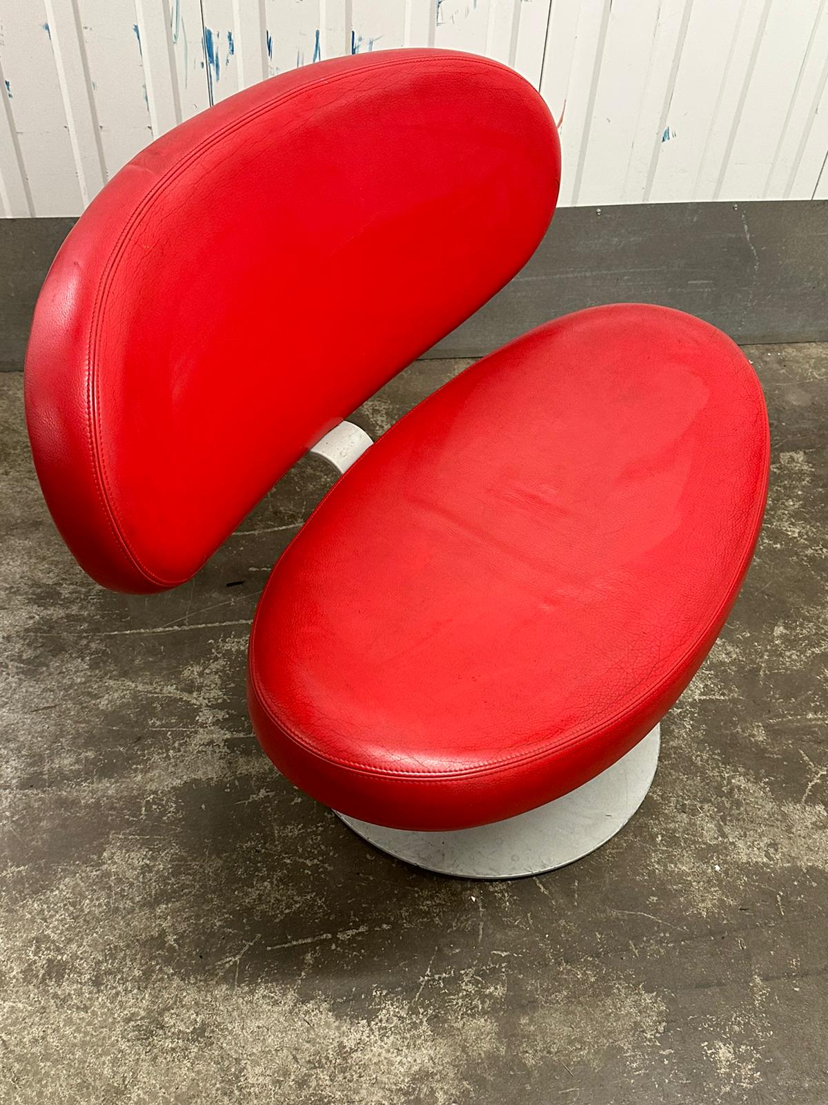 Sunset armchair by Christophe Pillet edited by Capellini in red leather