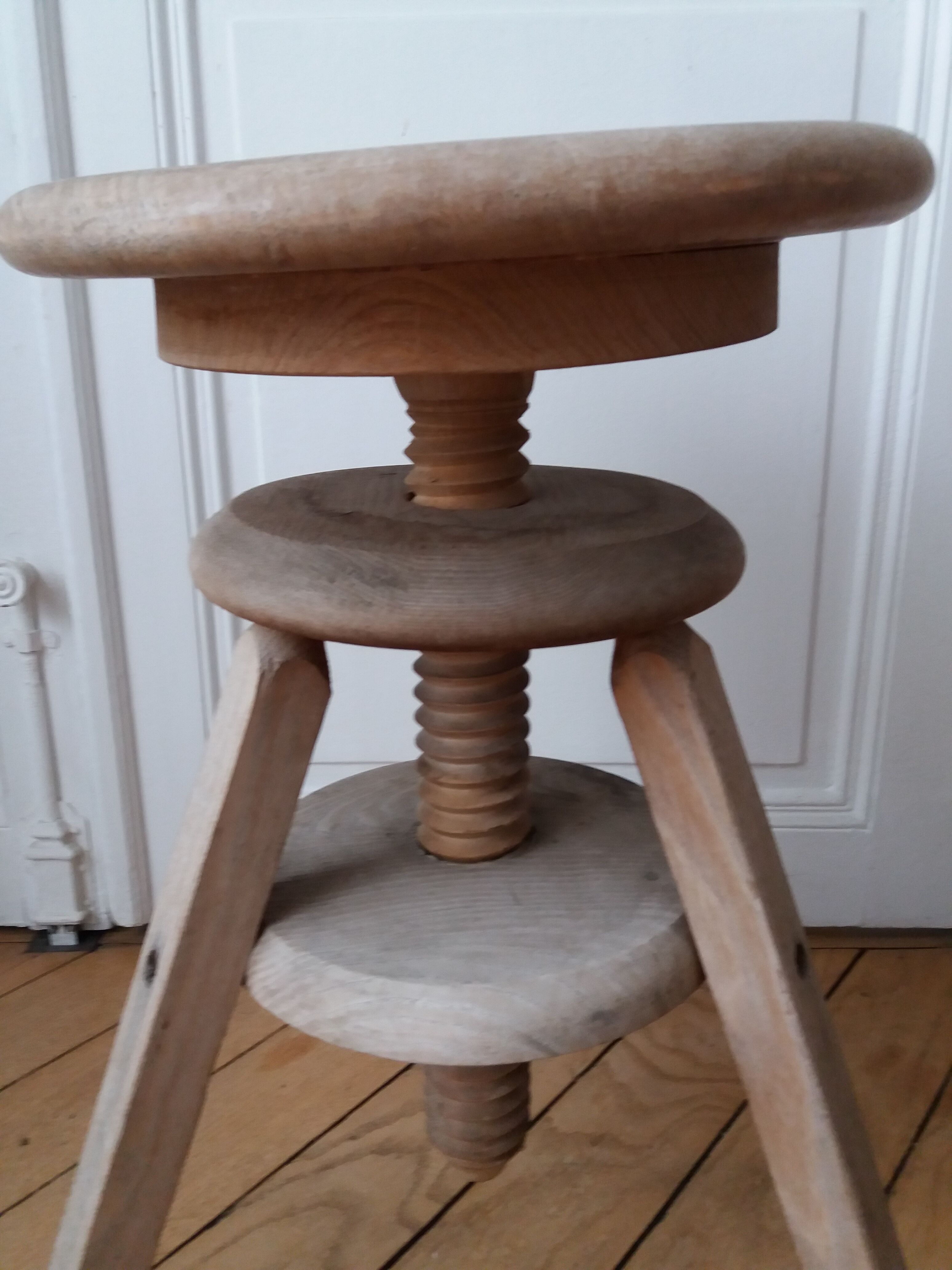 Old adjustable architect's stool in solid wood