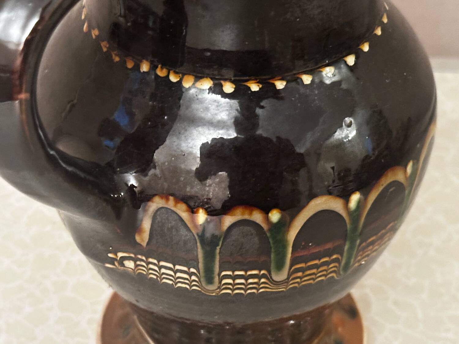 Vintage Romanian glazed pottery pitcher