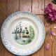 Vintage hollow serving dish with a decoration: marsh landscape.