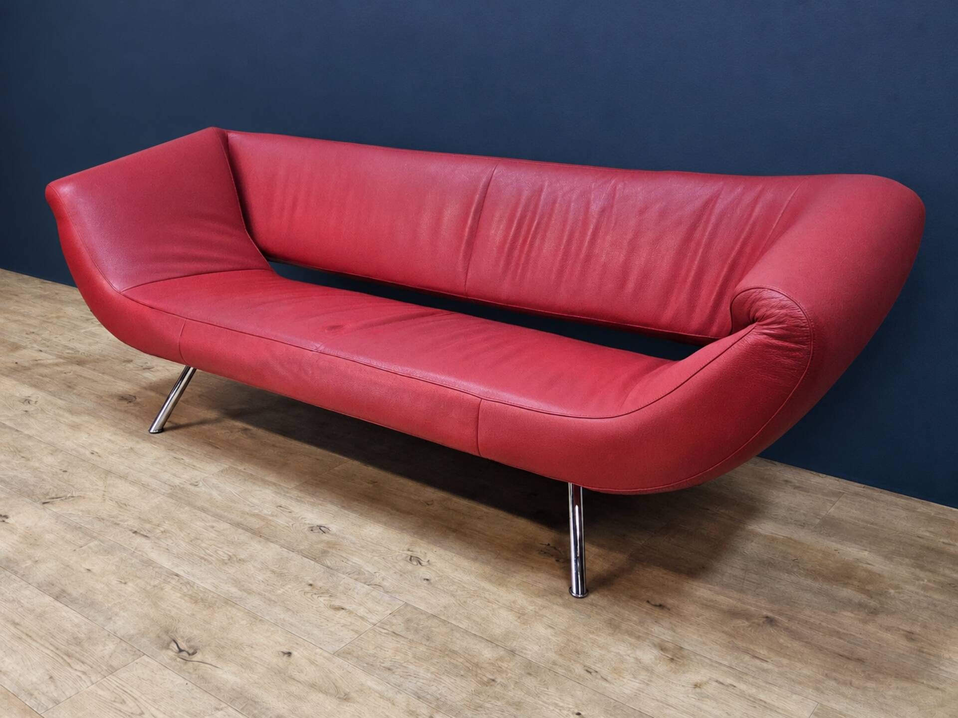 Vintage red leather Leolux Arabella design sofa used