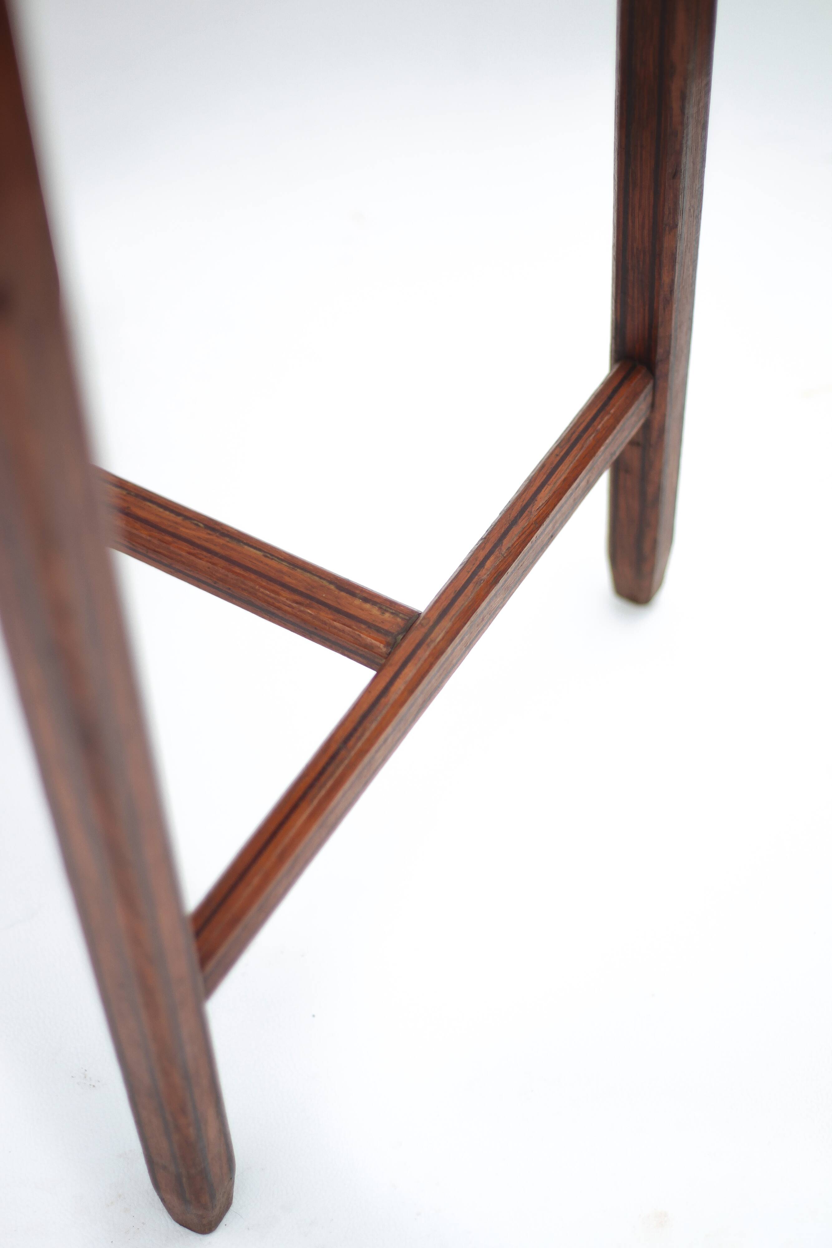 Wood table with marquetry, table with an antique parquet top, antique table.