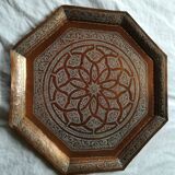Old oriental tray in chiseled copper