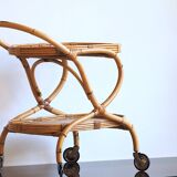 Vintage bamboo and rattan serving trolley on wheels