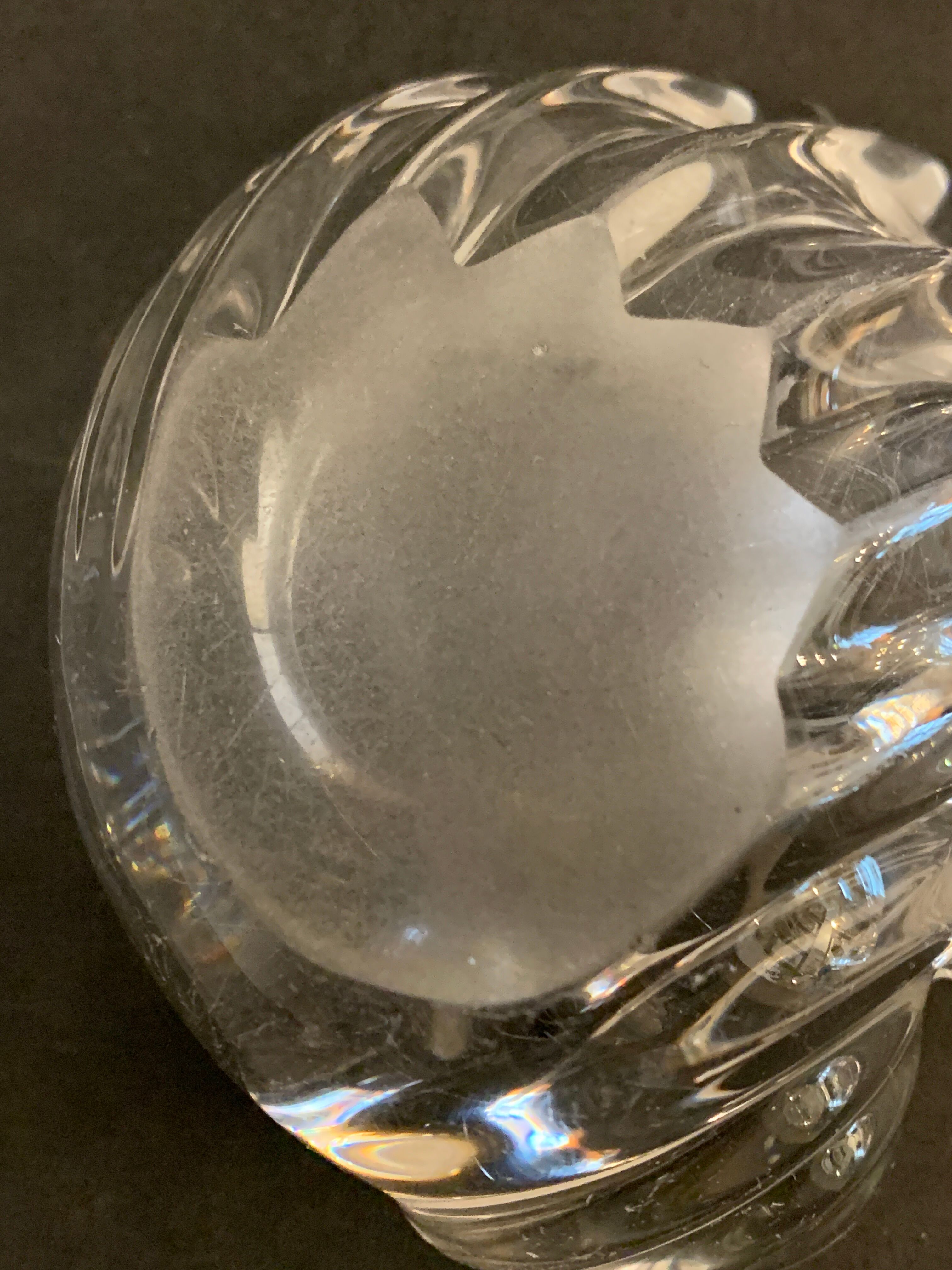 Empty crystal pocket in the shape of a shell