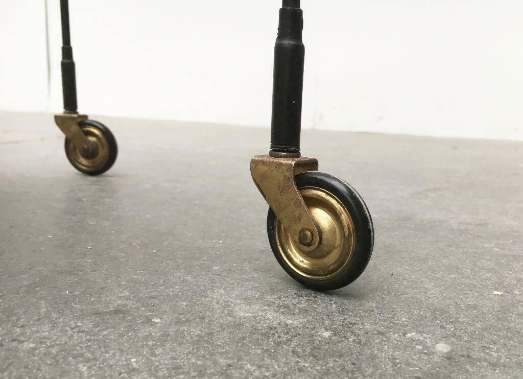 Minimalist perforated metal serving trolley in mid-century style, 1960s.