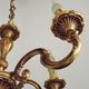 Vintage French traditional style bronze chandelier with 5 lights featuring acanthus leaf details.