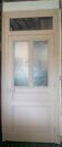 Large glazed door and its old glazed transom.