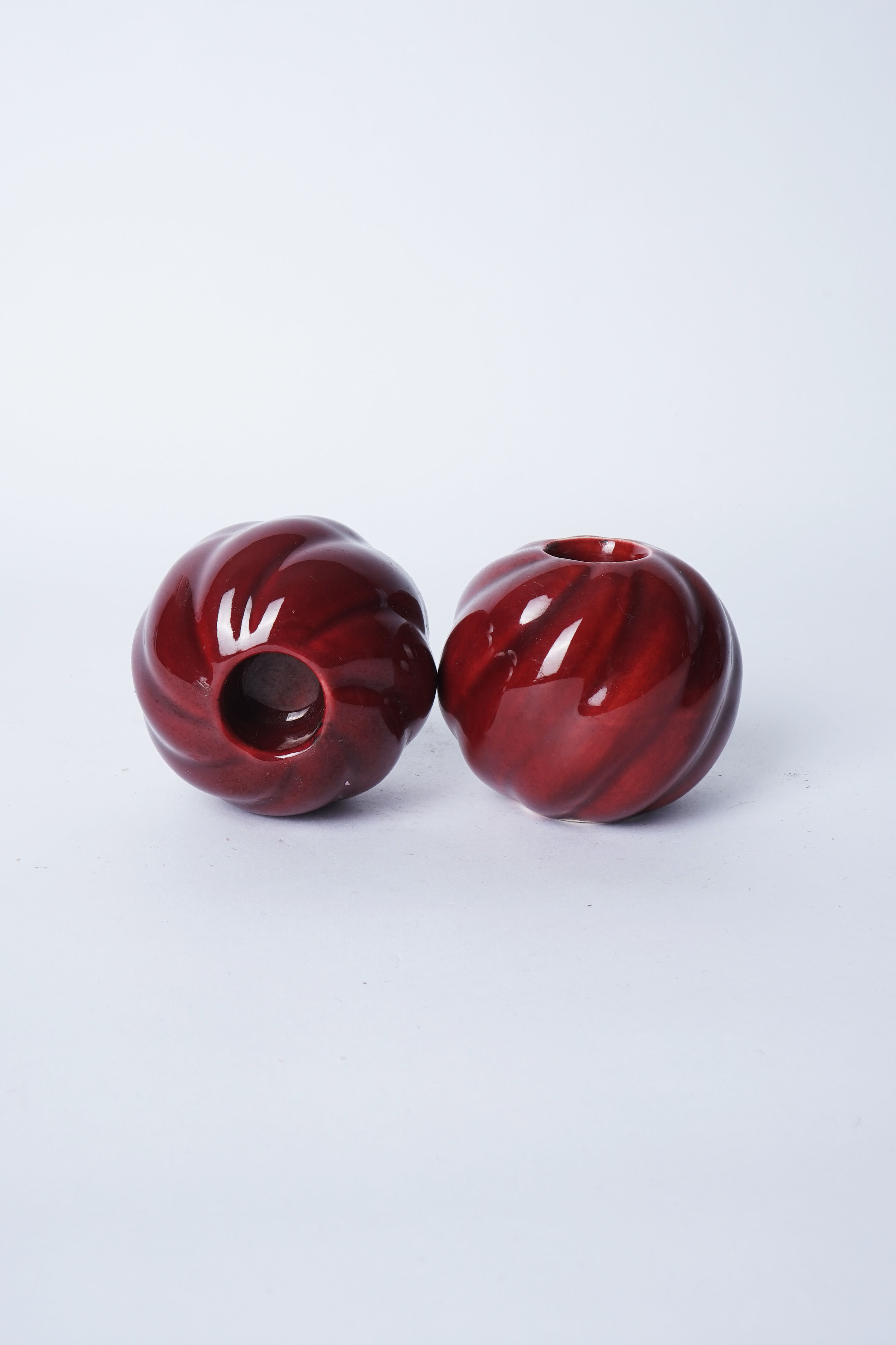 Pair of Red twisted candlesticks