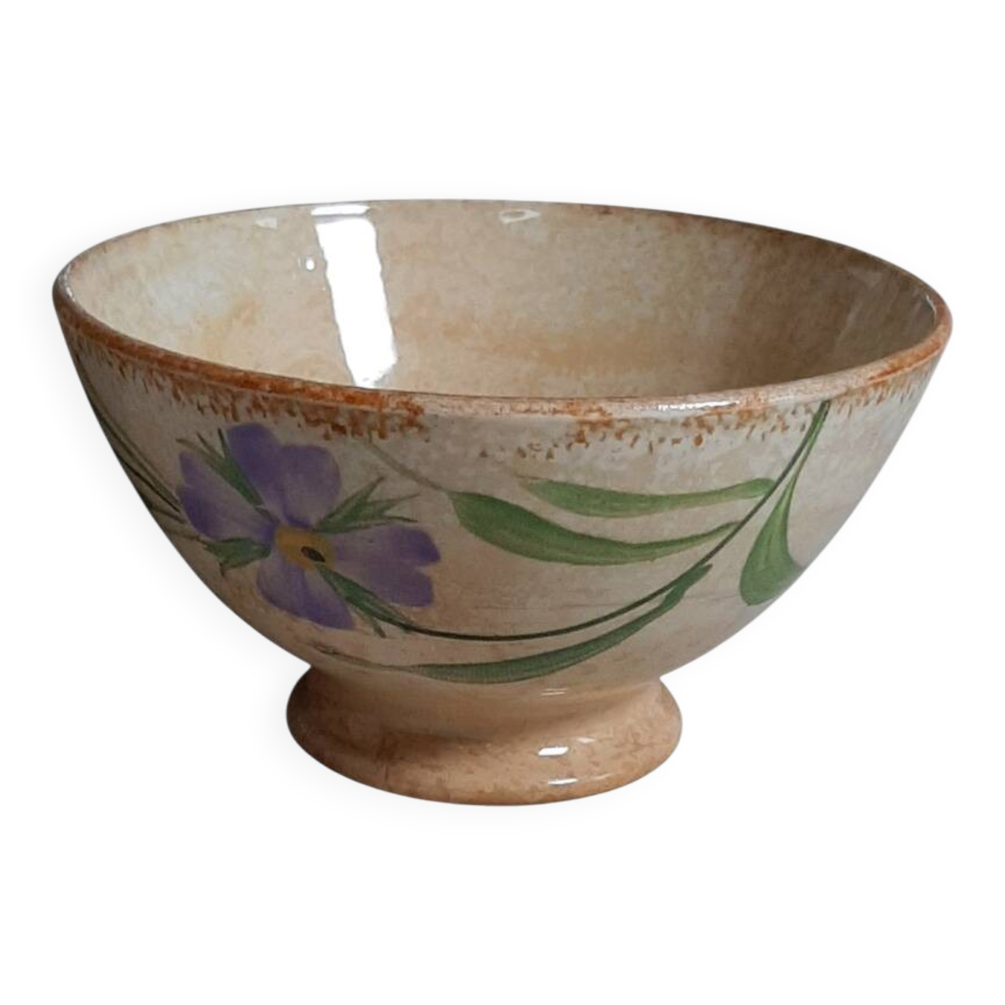 Old bowl in earthenware with floral decoration.