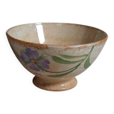 Old bowl in earthenware with floral decoration.