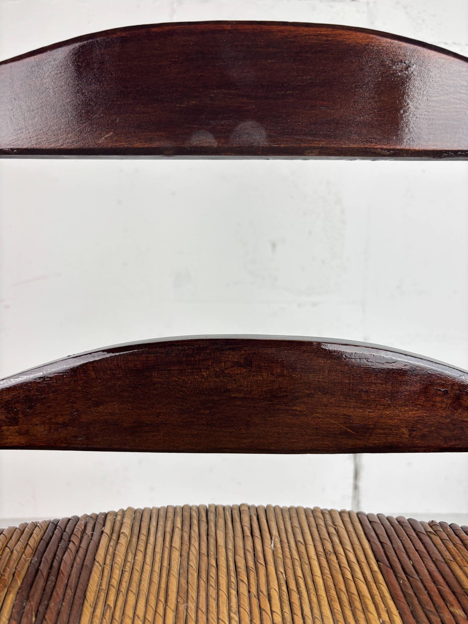 Brutalist wood turned bobbin low rush chair n the style of Charles Dudouyt
