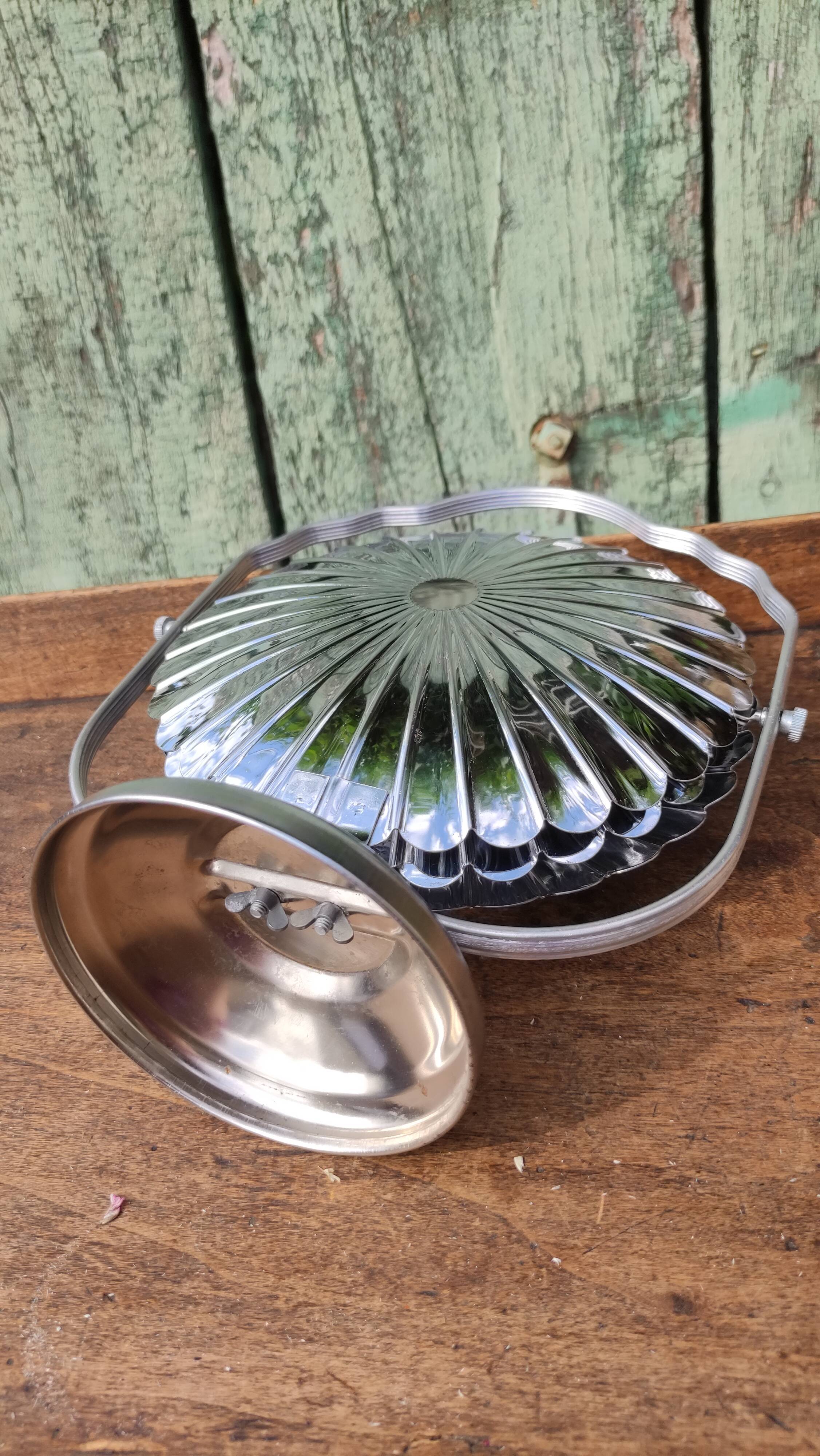 Serviteur pliable sur pied en métal argenté