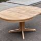 Scandinavian Baumann round extendable dining table with central leg, 115cm.