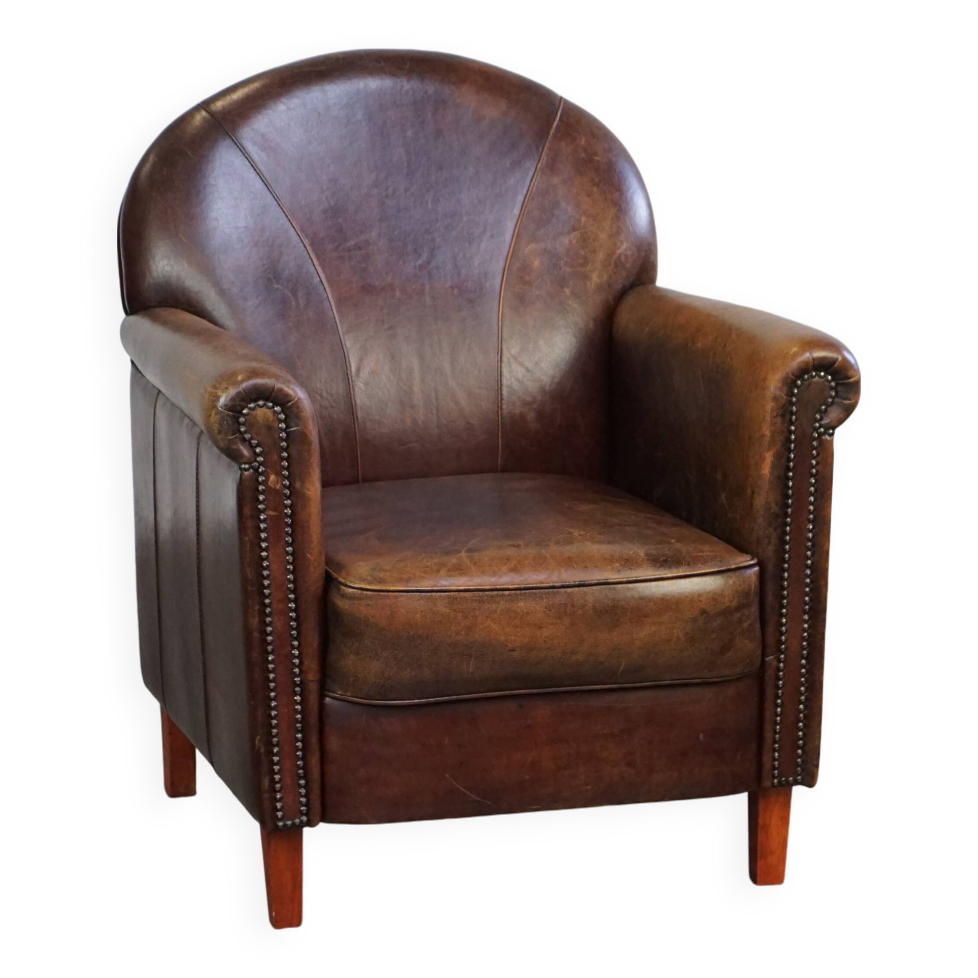 Fauteuil design en cuir de mouton aux finitions soignées et soignées