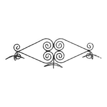 Twisted wrought iron wall coat rack with three hooks
