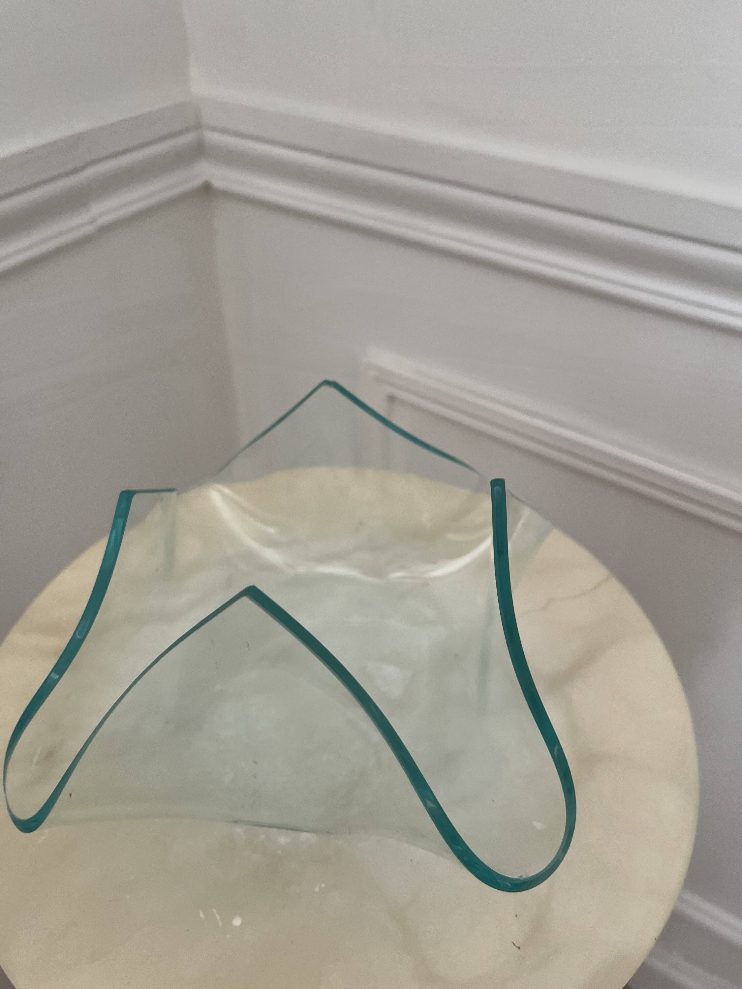 Empty pocket in the shape of a handkerchief in glass