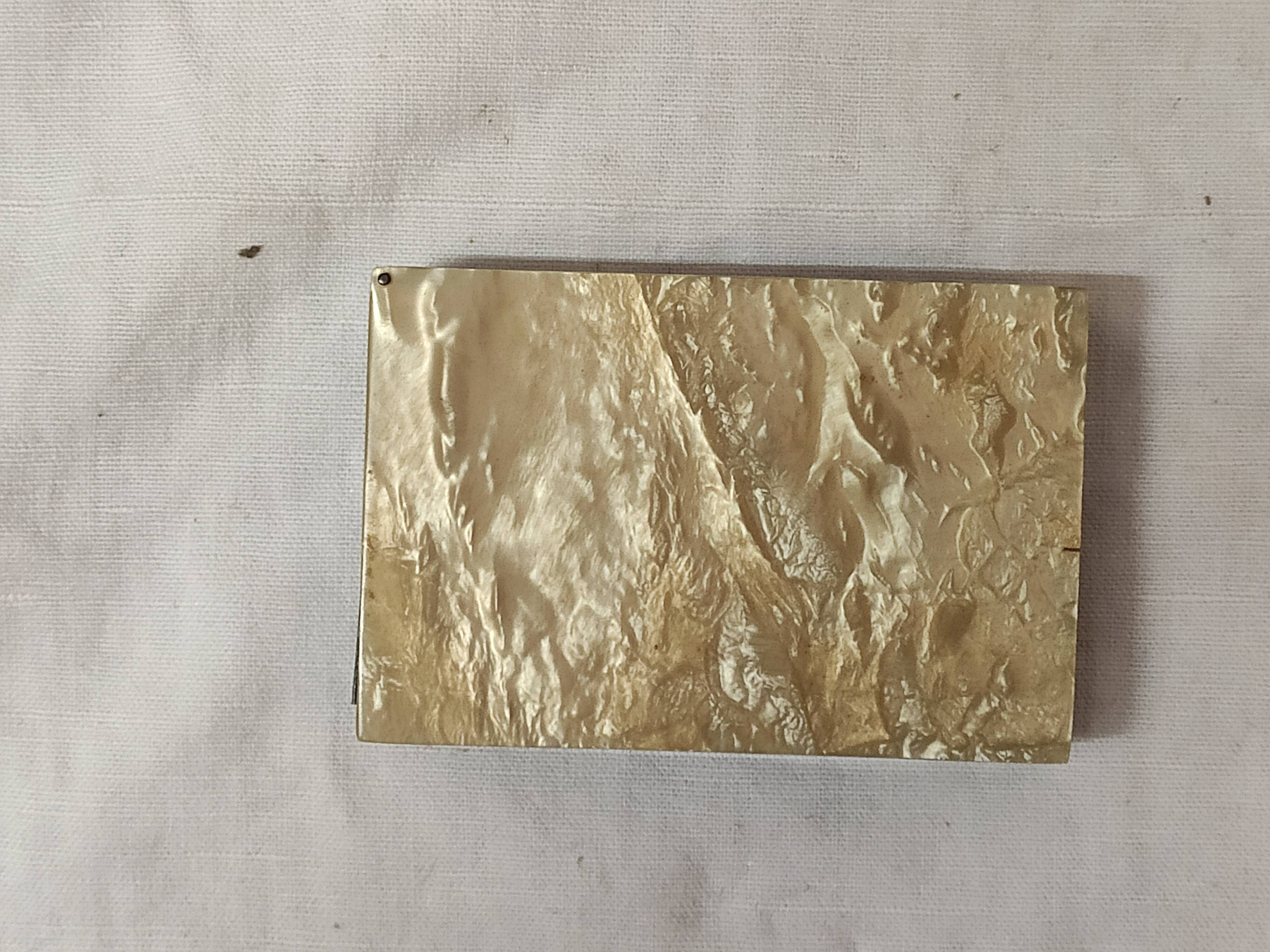 Cigarette case, 1930, tortoise scale & mother-of-pearl