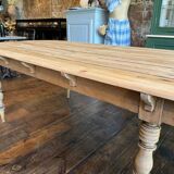 Large raw wood dining table