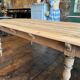 Large raw wood dining table