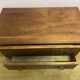 Petite commode de style Louis X.V. en parqueterie de bois de rose;