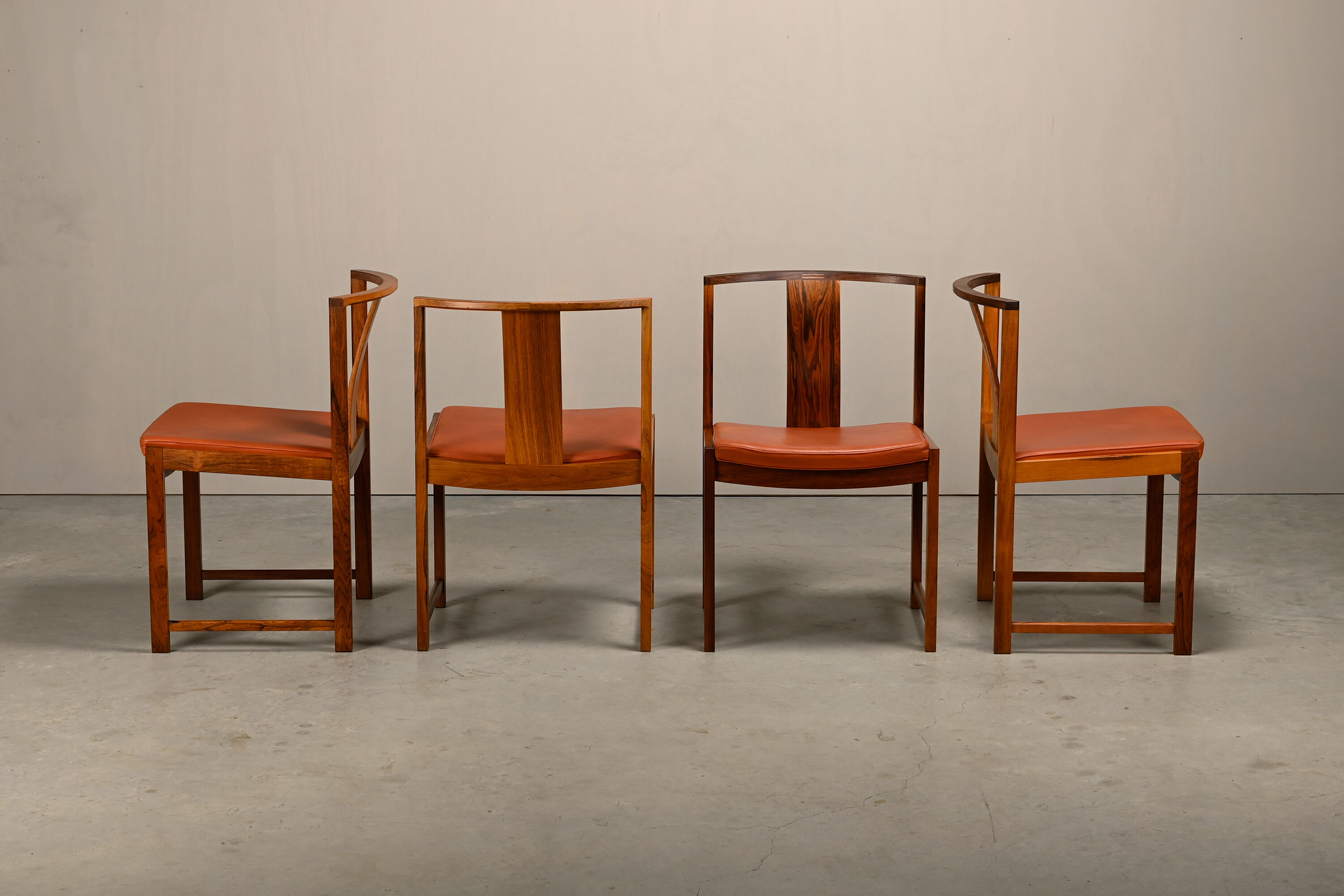 Steen Eiler Rasmussen Rosewood with leather dining chairs Model 700
