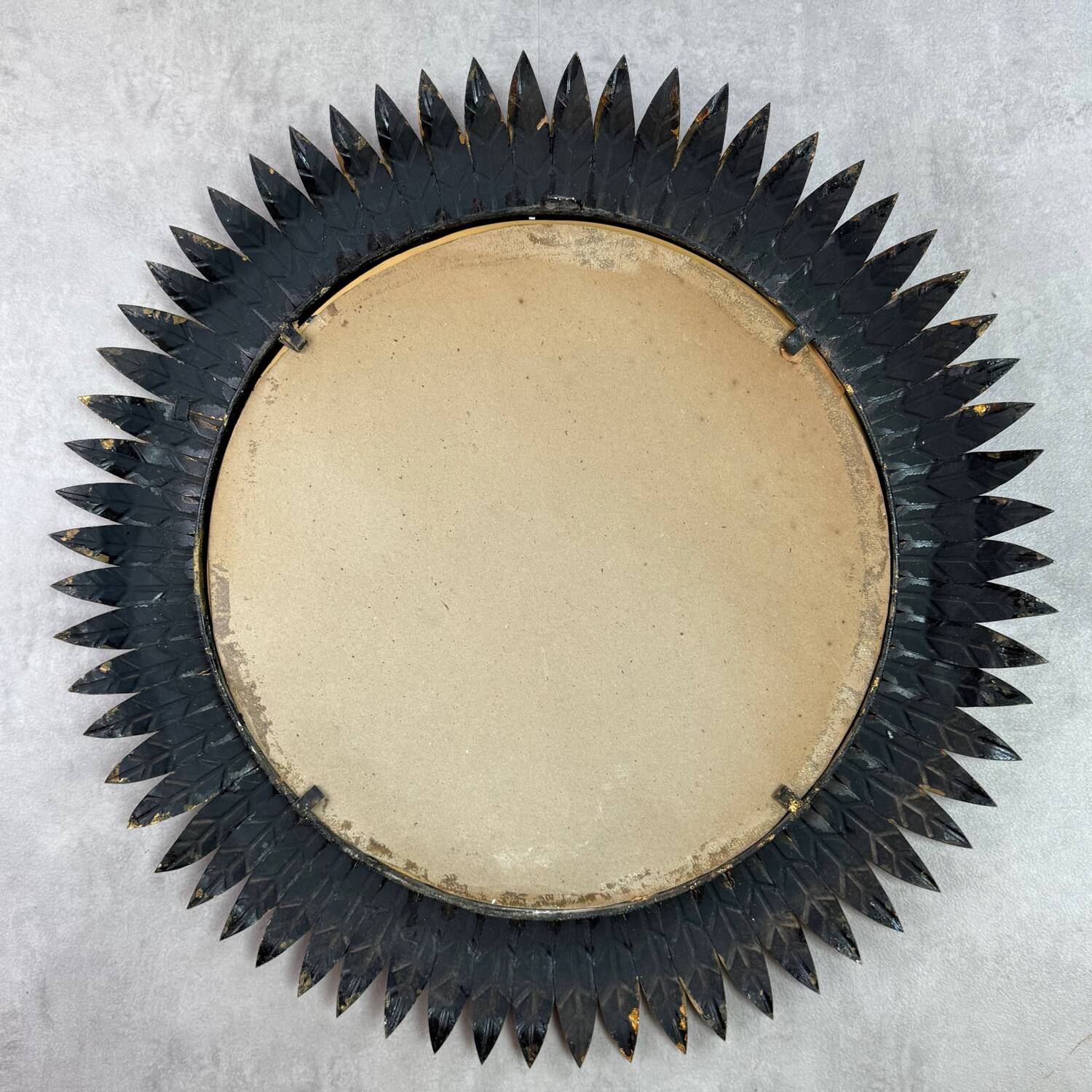 Round sun mirror in wrought iron from the 1950s Italy.