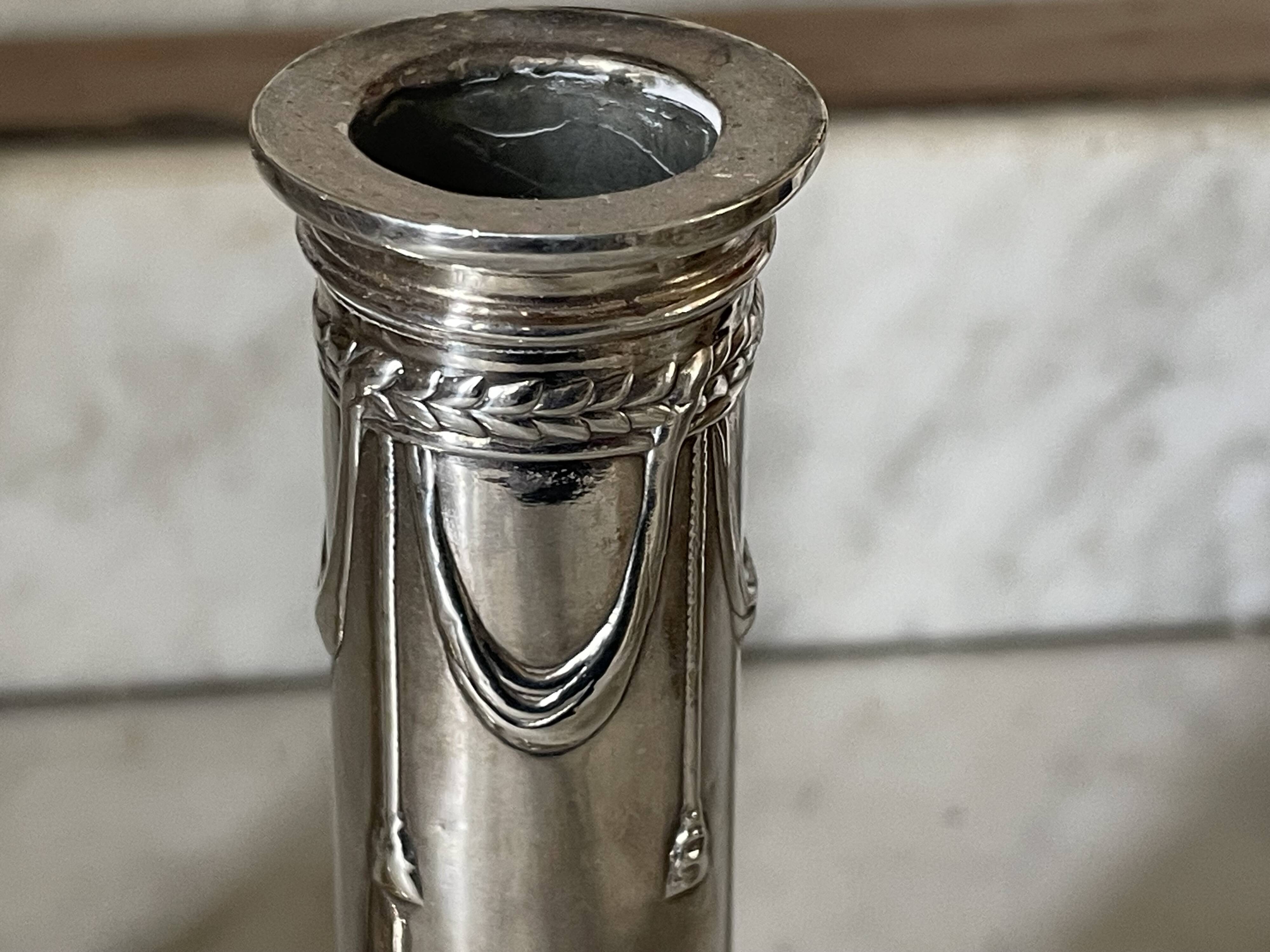pair of Victorian style silver-plated candlesticks