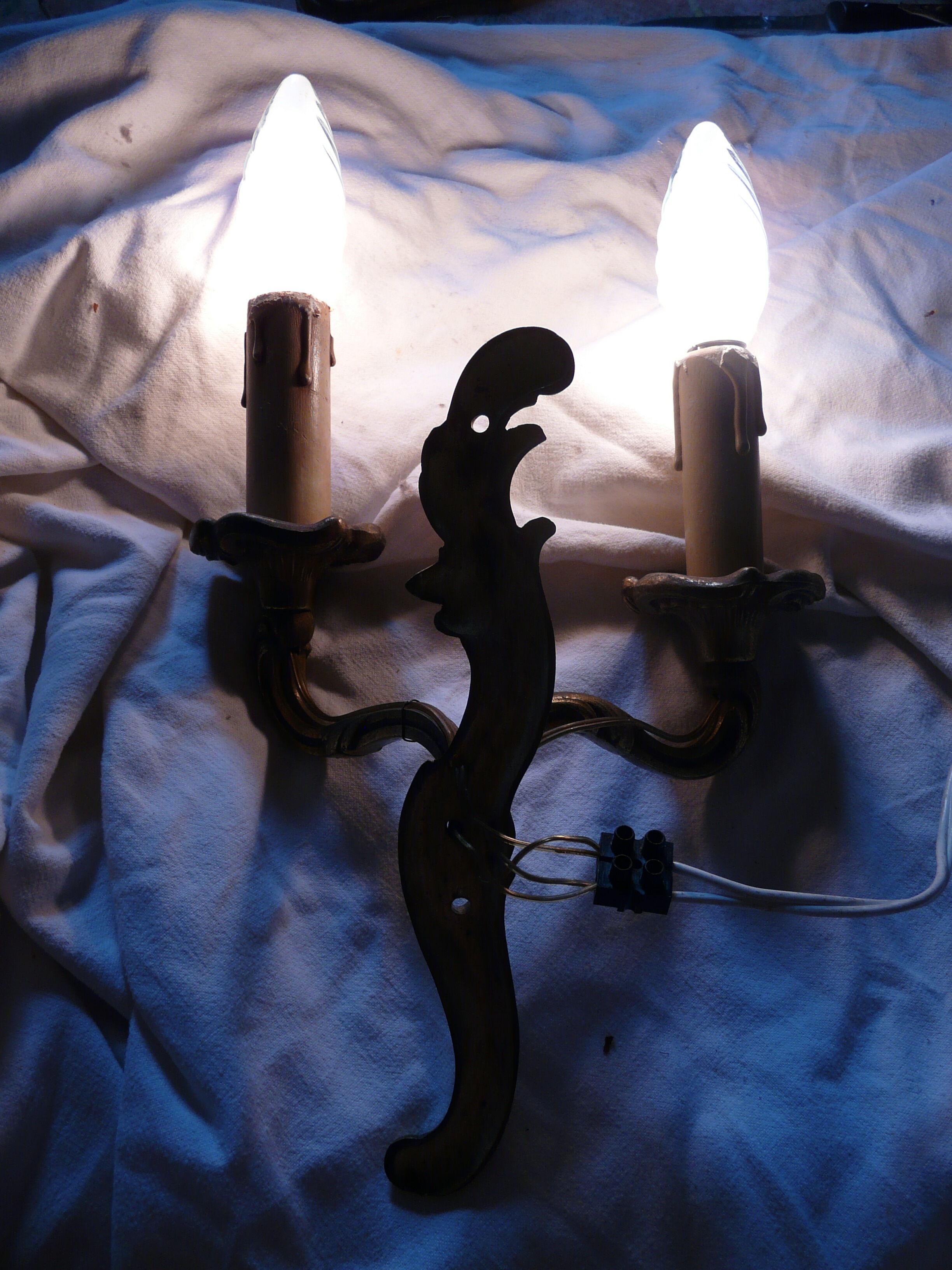 Two pairs of bronze wall lamps