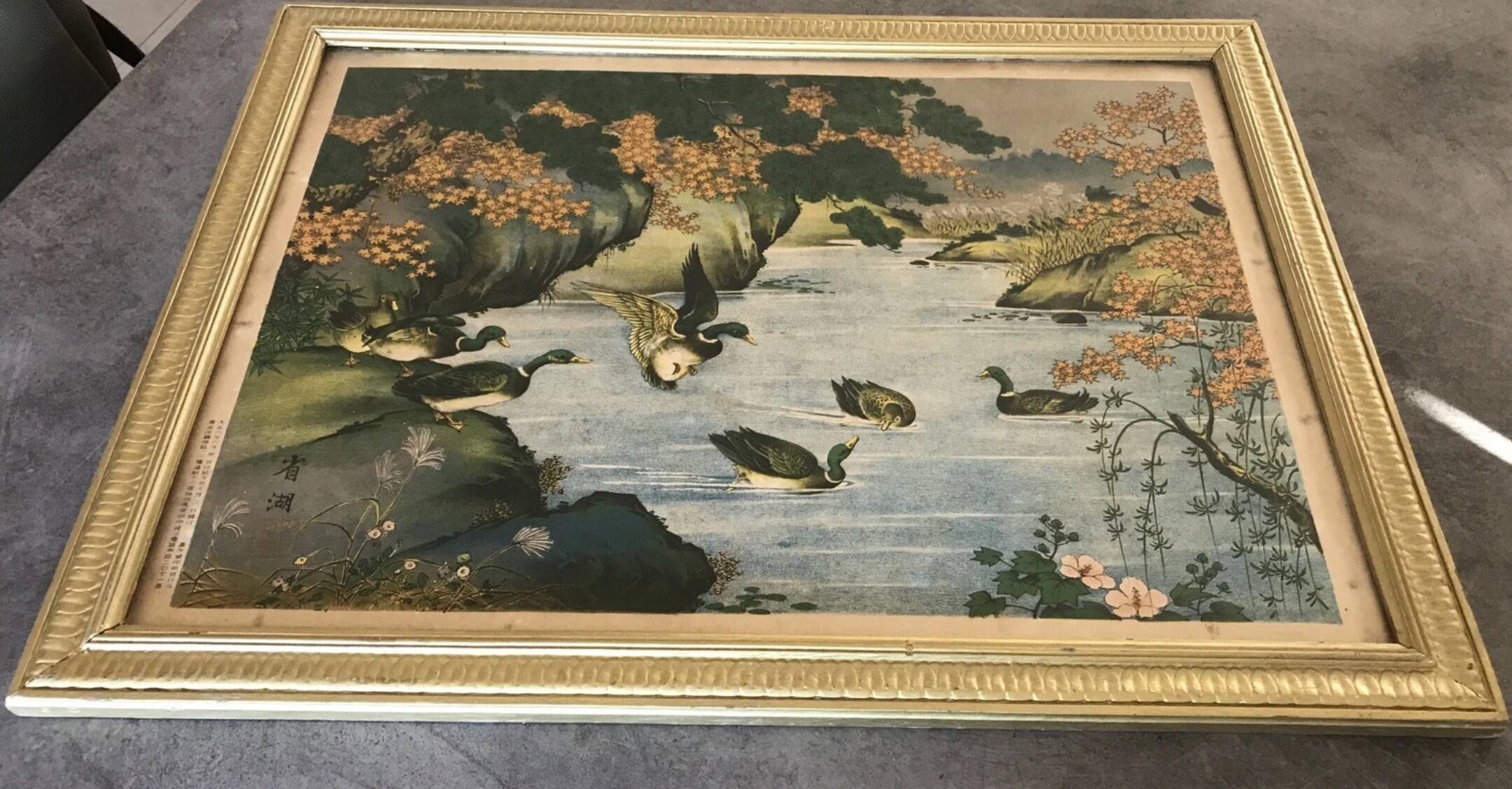 Old painting with a polychrome print decoration of ducks in nature.