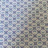 Vintage flat sheet for 2 people in cotton. Small blue and white patterns on a blue background